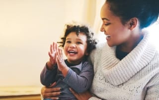 Woman holding toddler