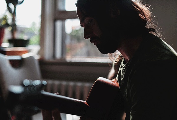 Man Playing Guitar